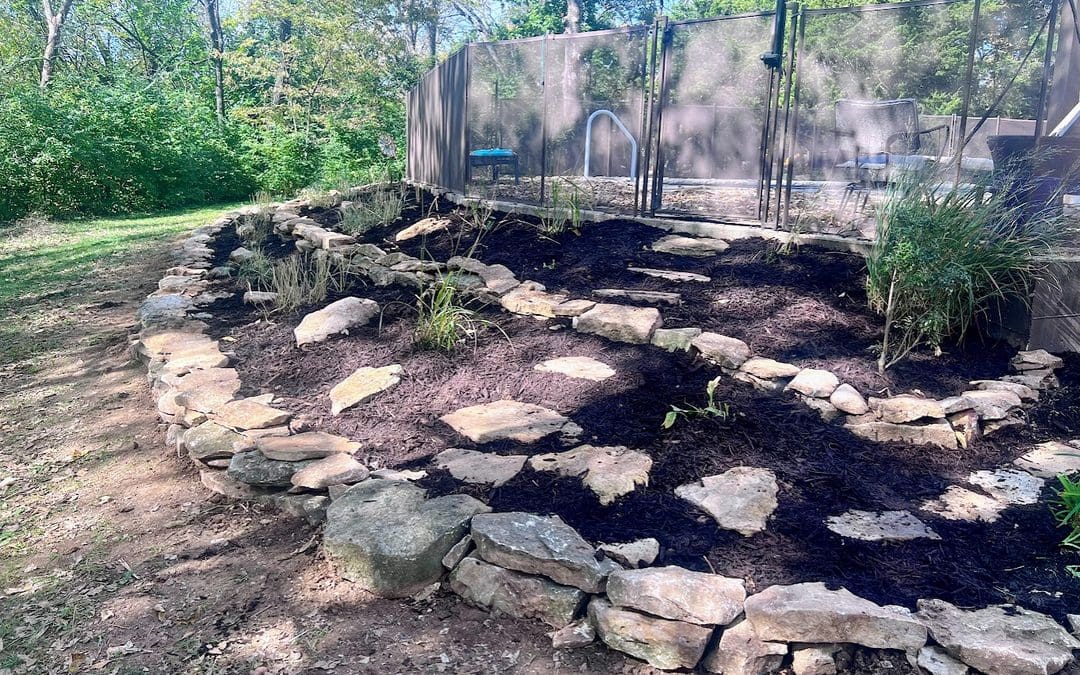 How We Fixed an Inherited Erosion Problem Using Only the Rocks and Mulch Already on Site